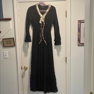 Amira Black Eyelet V Neck Pearl, Tassel & Ribbon Embellishment Maxi Dress
